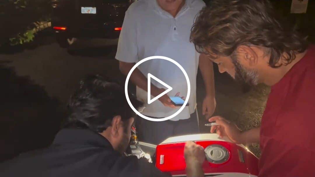 [Watch] MS Dhoni Signs Autograph on a Lucky Fan's Bike and Then Checks the Engine